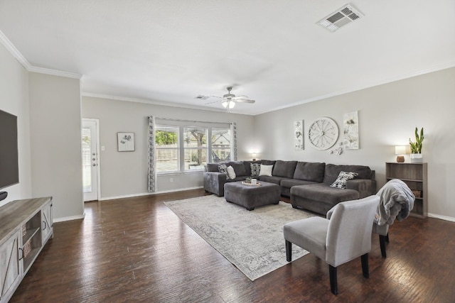 living room featuring ornamental molding, dark wood-type flooring, and ceiling fan