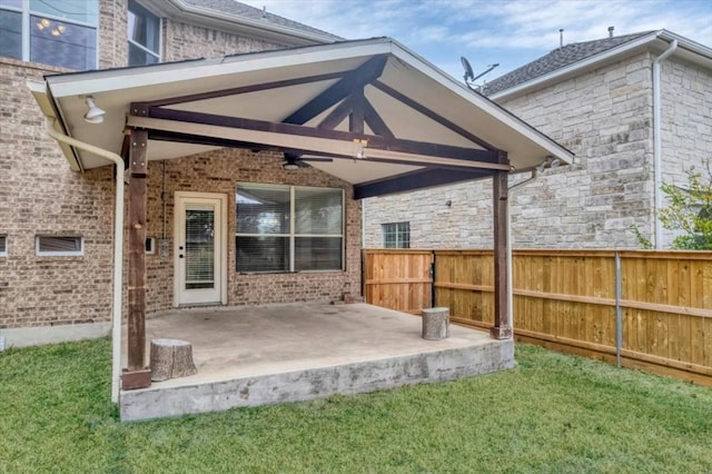 view of patio featuring ceiling fan