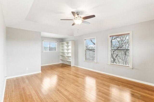 unfurnished room with ceiling fan and light hardwood / wood-style flooring