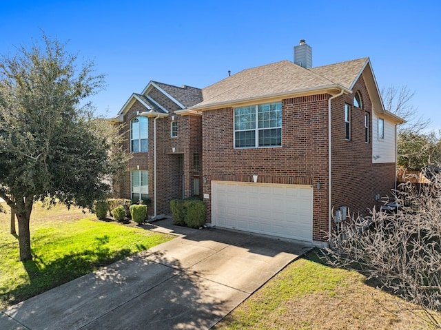 front of property featuring a garage and a front lawn