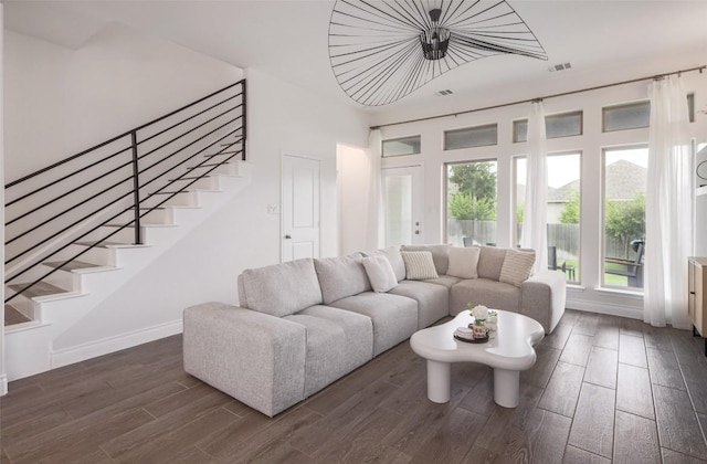 living room featuring dark hardwood / wood-style flooring