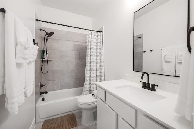 full bathroom with vanity, shower / bath combination with curtain, and toilet