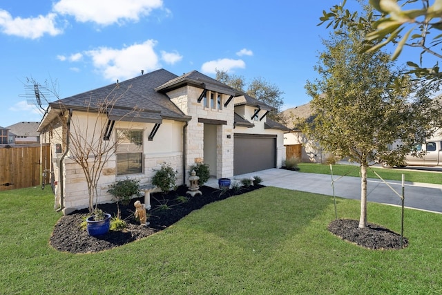 view of front facade featuring a garage and a front yard