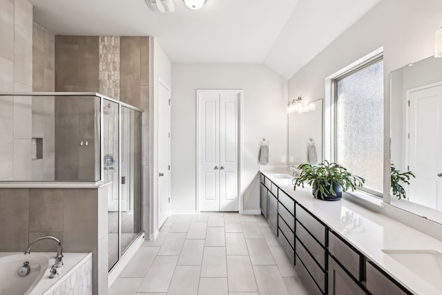 bathroom featuring tile patterned floors, vanity, and independent shower and bath