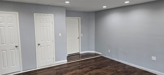 unfurnished bedroom featuring hardwood / wood-style floors