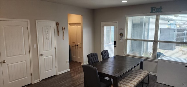 dining area featuring dark hardwood / wood-style floors