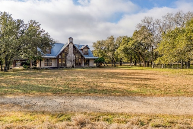 exterior space with a front yard