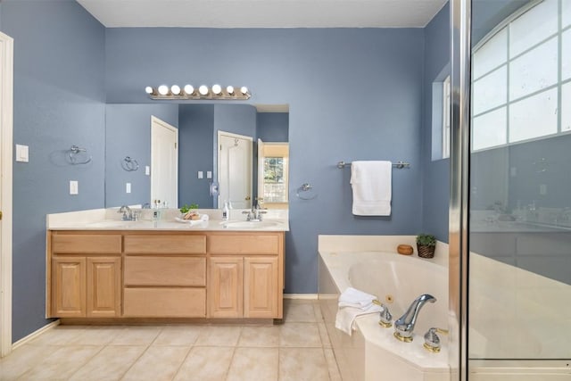 bathroom with vanity, tile patterned floors, and independent shower and bath