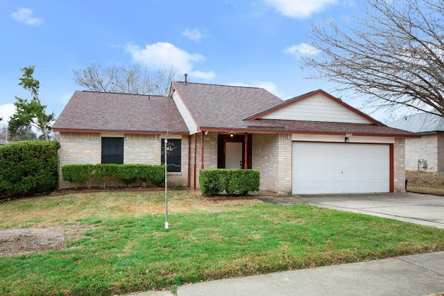 single story home featuring a garage and a front lawn