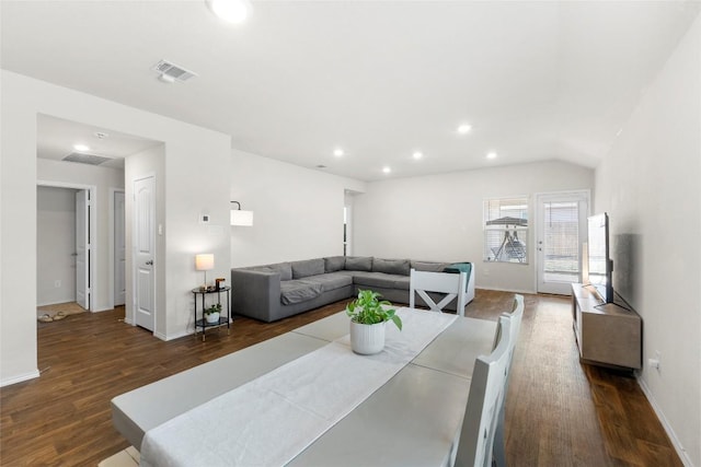 dining area featuring dark wood-style floors, visible vents, recessed lighting, and baseboards