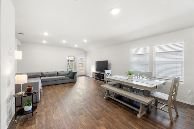 living area featuring wood finished floors, baseboards, visible vents, recessed lighting, and vaulted ceiling