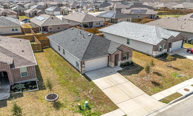 drone / aerial view with a residential view