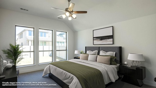 carpeted bedroom featuring vaulted ceiling, baseboards, and visible vents