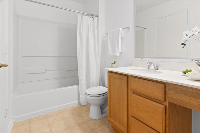 full bath with tile patterned floors, shower / bath combo with shower curtain, toilet, and vanity