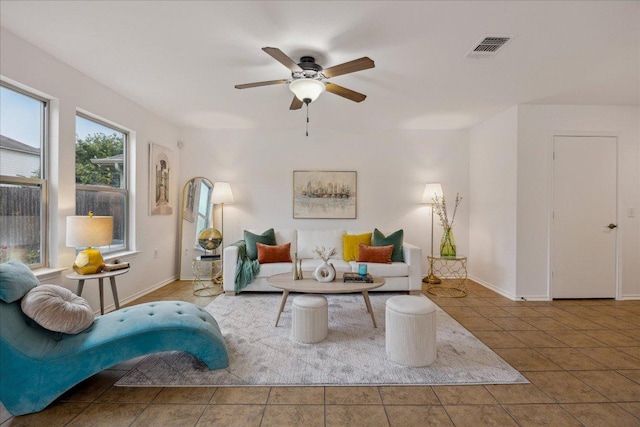 11009 Roderick Lawson Ln, Austin, TX 78754 - living room featuring a ceiling fan, tile patterned flooring, and baseboards