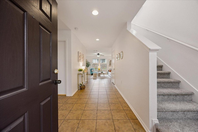 11009 Roderick Lawson Ln, Austin, TX 78754 - entryway with stairway, light tile patterned flooring, baseboards, recessed lighting, and a ceiling fan