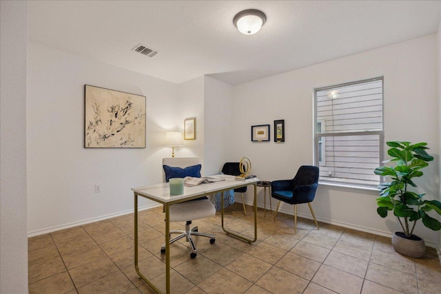 11009 Roderick Lawson Ln, Austin, TX 78754 - home office featuring baseboards and tile patterned flooring
