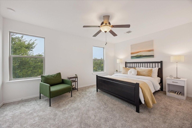 11009 Roderick Lawson Ln, Austin, TX 78754 - bedroom with carpet floors, baseboards, and ceiling fan