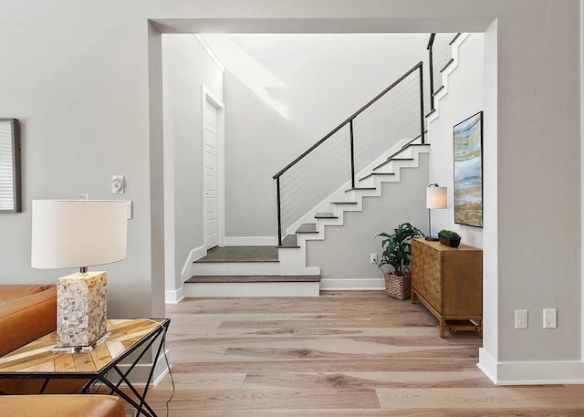 foyer entrance with wood-type flooring