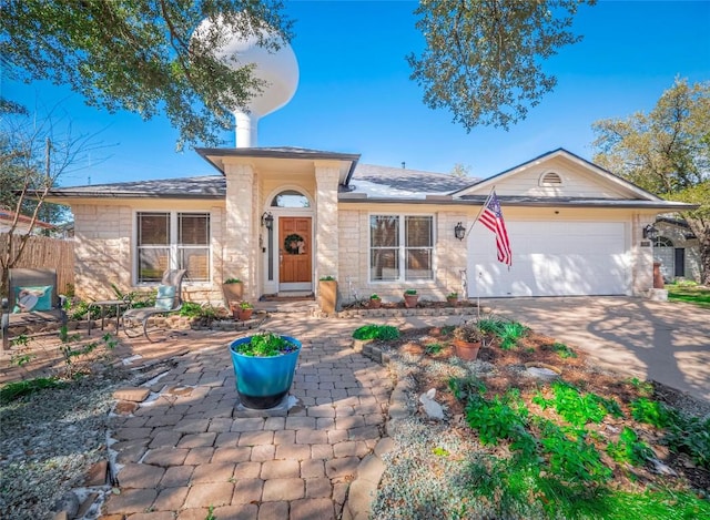 ranch-style house featuring a garage