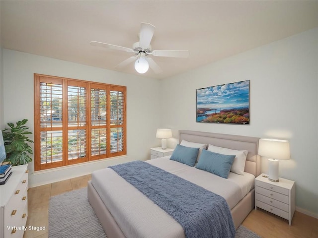 bedroom featuring ceiling fan