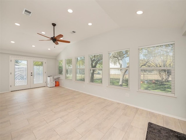 unfurnished sunroom featuring vaulted ceiling, french doors, and ceiling fan