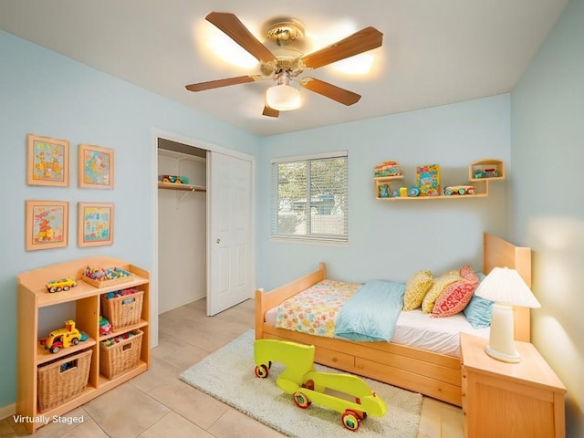 bedroom featuring a closet and ceiling fan