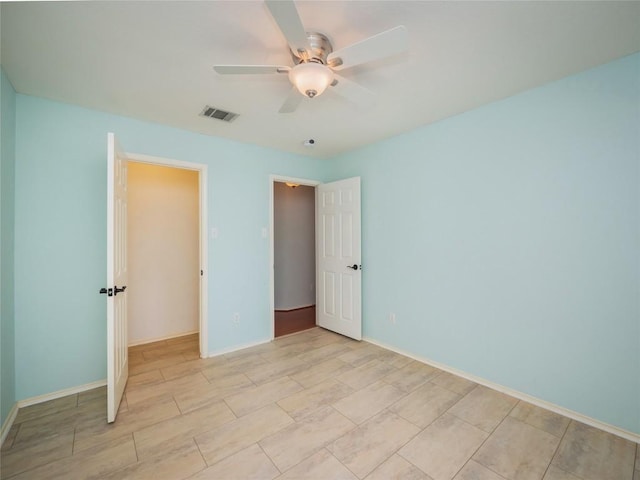 unfurnished bedroom with ceiling fan