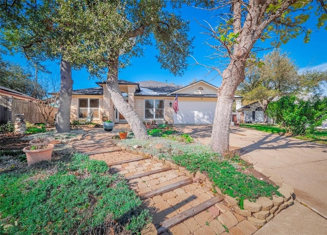 ranch-style home with a garage