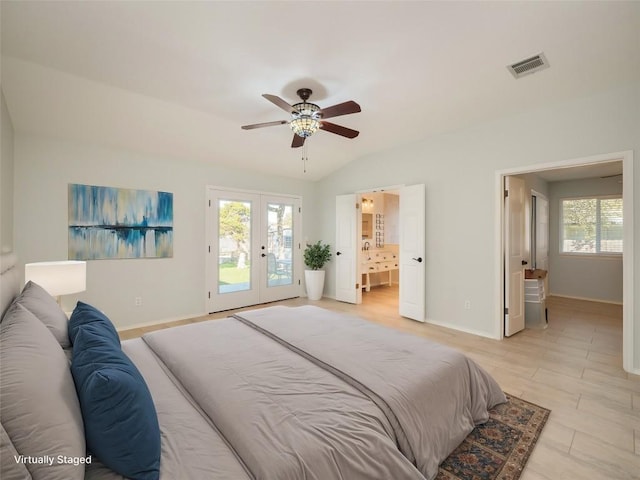 bedroom featuring vaulted ceiling, ensuite bathroom, access to outside, ceiling fan, and french doors