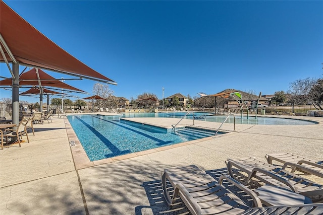 view of pool featuring a patio area