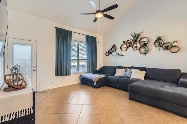 tiled living room featuring high vaulted ceiling and ceiling fan