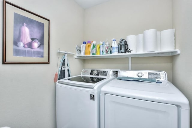 washroom with washer and clothes dryer