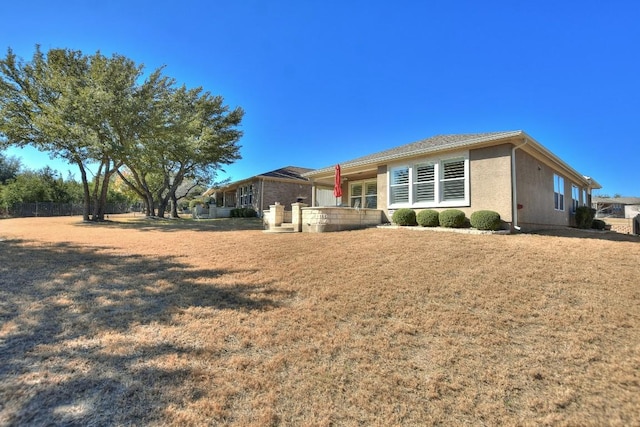 exterior space with a yard