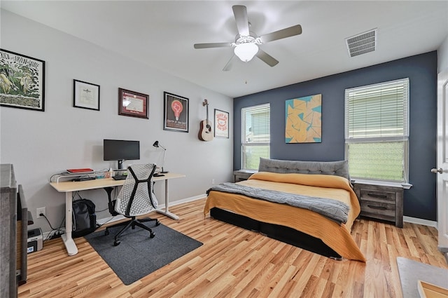 bedroom featuring ceiling fan and light hardwood / wood-style flooring