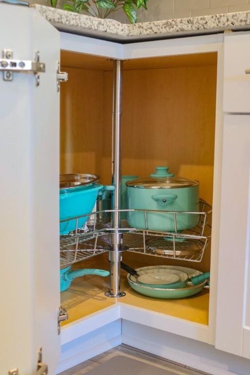 interior details featuring white cabinets