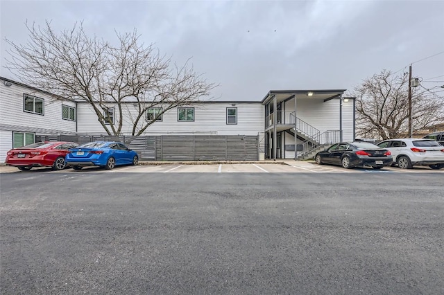 1200 E 52nd St Unit 108, Austin, TX 78723 - townhome / multi-family property with uncovered parking and stairs