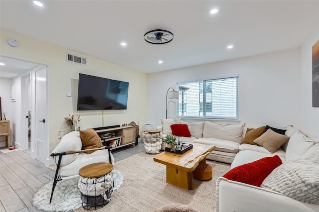 1200 E 52nd St Unit 108, Austin, TX 78723 - living area featuring recessed lighting and wood finished floors