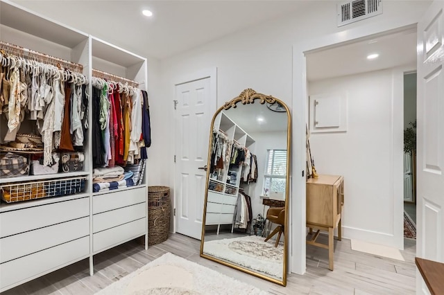 1200 E 52nd St Unit 108, Austin, TX 78723 - spacious closet featuring light wood-style flooring