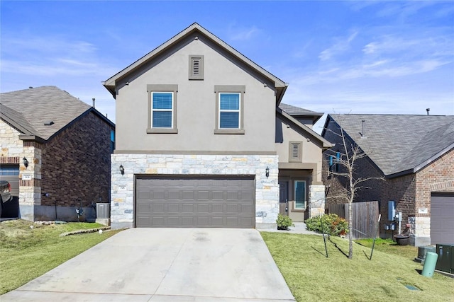 view of front facade with stone siding, concrete driveway, and stucco siding