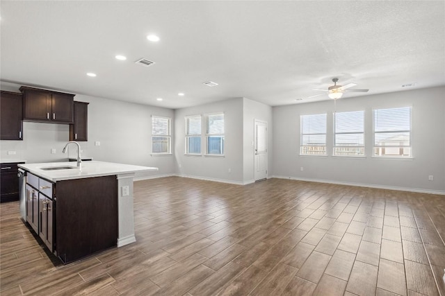 798 Eves Necklace Dr, Buda, TX 78610 - kitchen with a sink, open floor plan, a ceiling fan, plenty of natural light, and recessed lighting