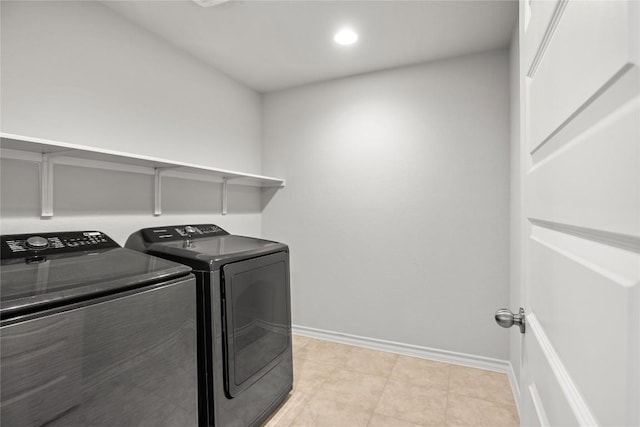 laundry room with light tile patterned floors, recessed lighting, laundry area, separate washer and dryer, and baseboards