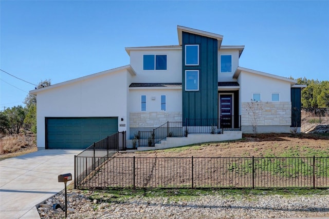 4067 Outpost Trce, Lago Vista, TX 78645 - contemporary house with stone siding, driveway, an attached garage, a fenced front yard, and stucco siding