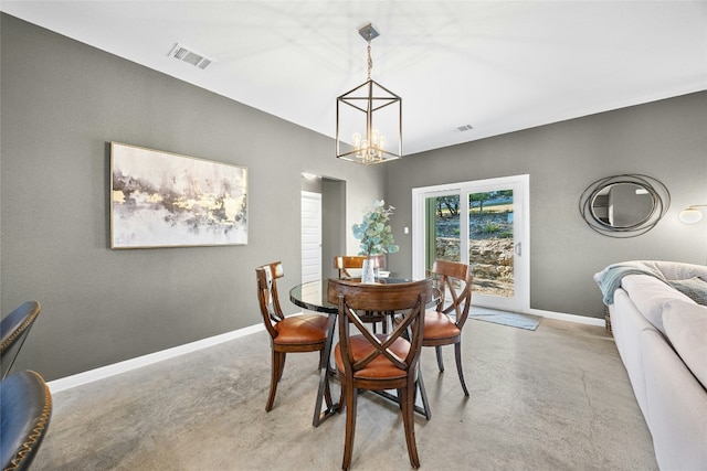 dining room with a notable chandelier