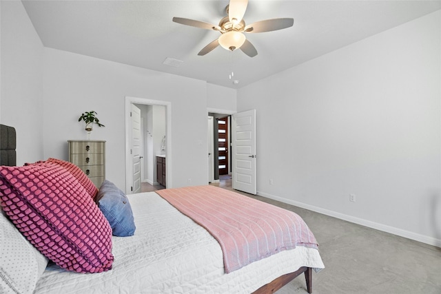 carpeted bedroom featuring ensuite bathroom and ceiling fan