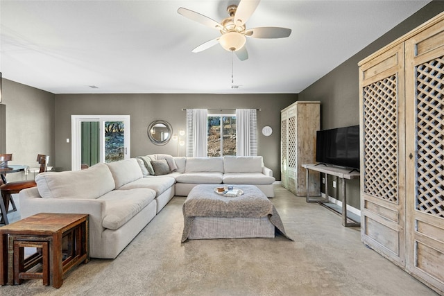 living room with ceiling fan