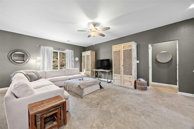 living room featuring ceiling fan and light colored carpet