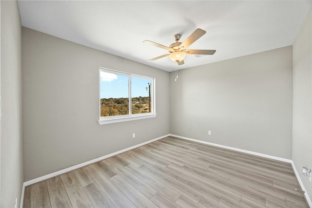 unfurnished room with ceiling fan and light hardwood / wood-style floors