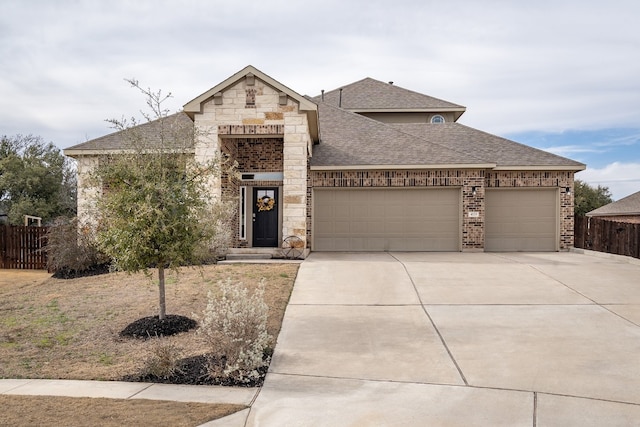 view of front of home with a garage