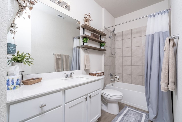 full bathroom with vanity, wood-type flooring, shower / bath combination with curtain, and toilet